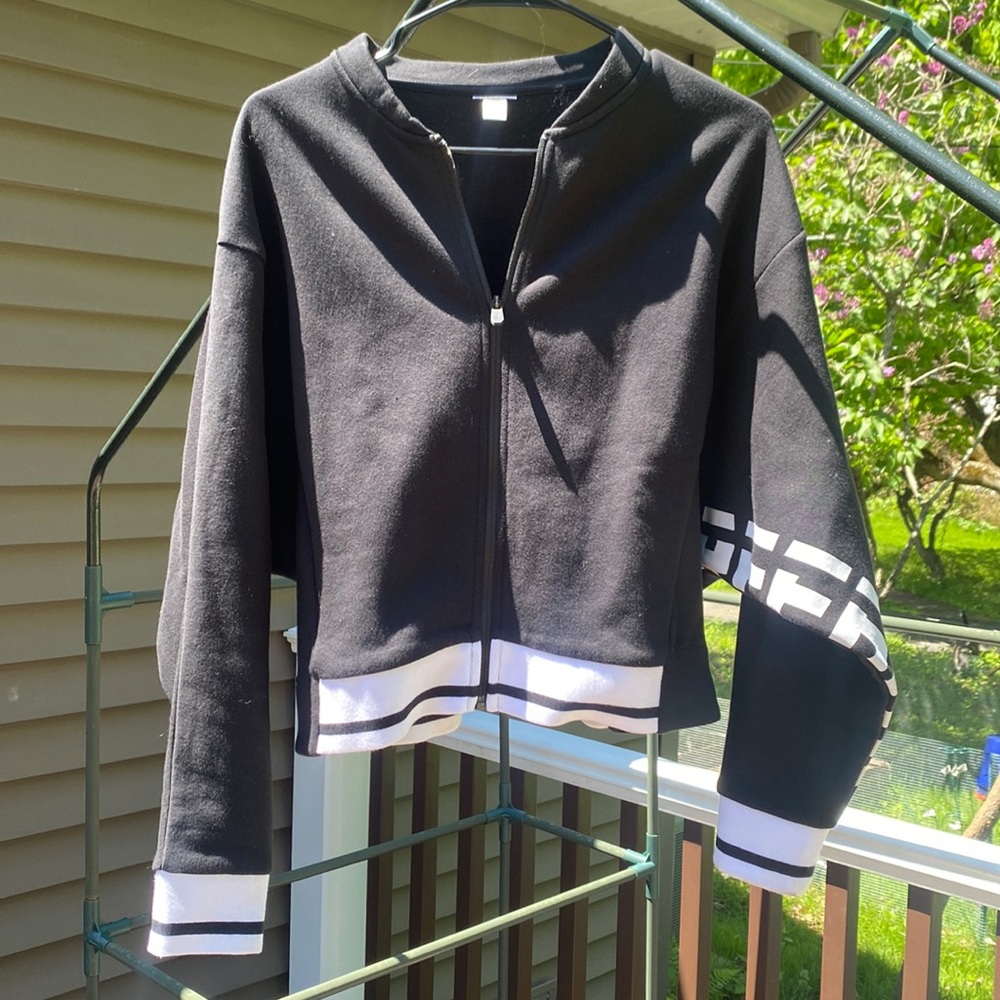 Reebok Meet You There (MYT) Track Jacket in black size M-L Like New
